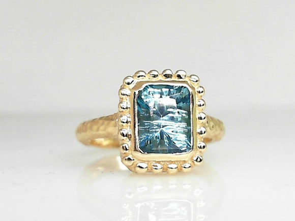 Yellow Gold Carribbean Blue Topaz Textured/Beaded Bezel Set Ring