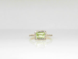 Yellow Gold Peridot Ring with .21 CT Diamond halo and shank