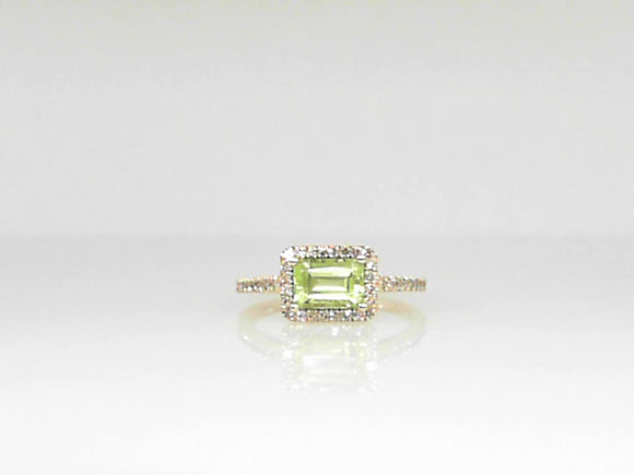 Yellow Gold Peridot Ring with .21 CT Diamond halo and shank