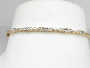 Yellow Gold Round and Baguette Diamond Bangle with 0.38 CTW