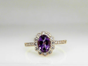 Yellow Gold Oval Amethyst Ring with 0.18 CT Diamond Halo