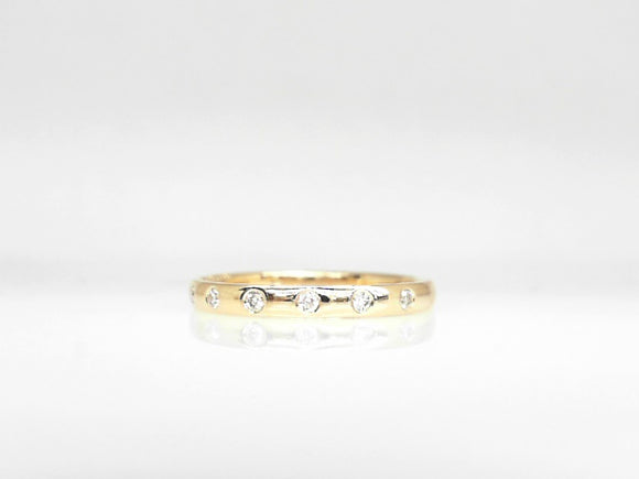 Yellow Gold Diamond Bezel Set Wedding Band