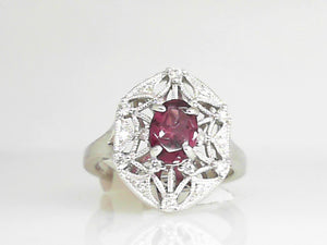 White Gold Oval Garnet and Diamond Ring