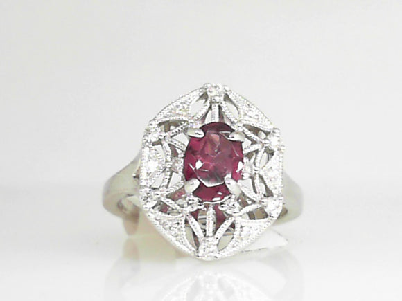 White Gold Oval Garnet and Diamond Ring