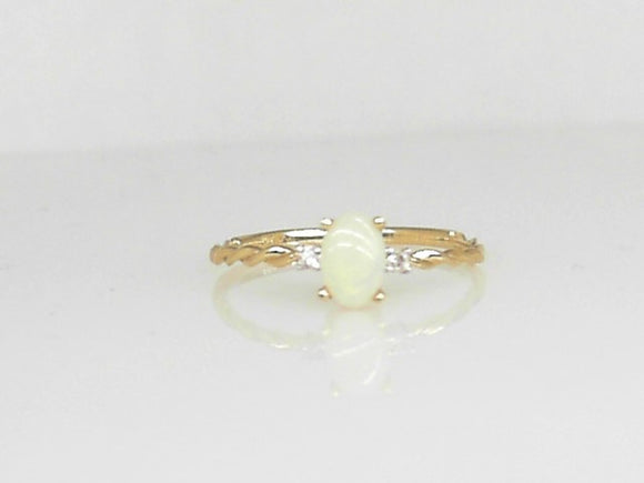 Yellow Gold Oval Opal Ring with Two Diamonds