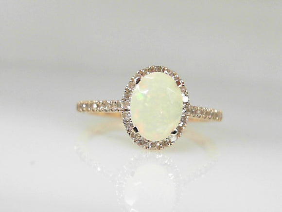 Yellow Gold Oval Opal Ring with Diamond Halo and Shanks