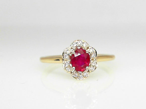 Yellow Gold Oval Ruby Ring with 0.41 CT Diamond Halo