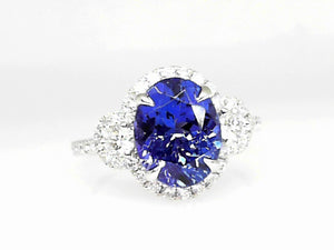 White Gold Oval Tanzanite and Diamond Ring