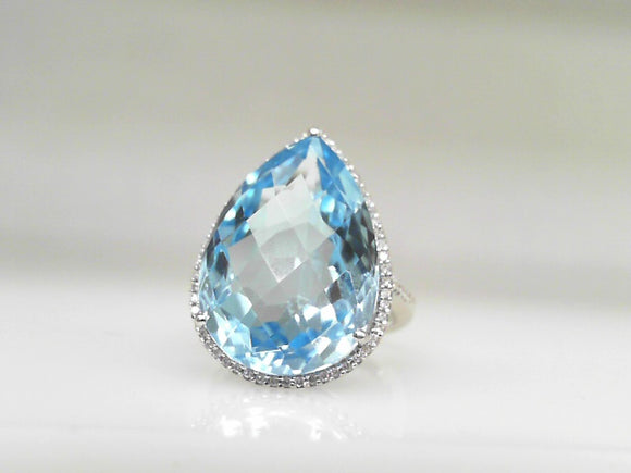 14k White Gold Blue Topaz and Diamond Pear shape ring