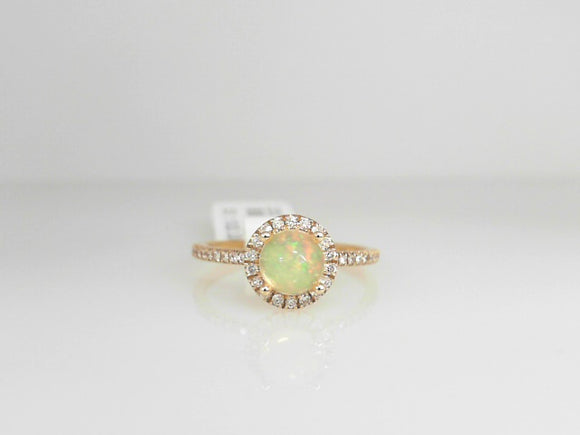 Yellow Gold Opal Ring with a Diamond Halo and Shank