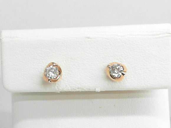 0.50 Ct Diamond Studs in a Rose Gold Mounting