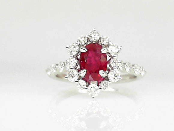 White Gold Oval Ruby Ring with a Diamond Halo