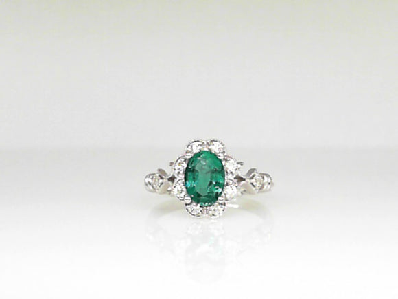 White Gold Oval Emerald Ring with .21 CT Diamond Halo and Shank