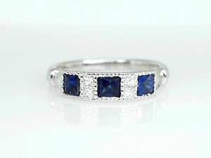 18K WG .54 CT Sapphire & .11 CT Diamond Band