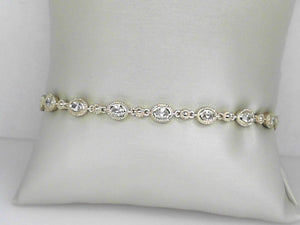 Yellow Gold Bezel Set Oval Diamond Tennis Bracelet