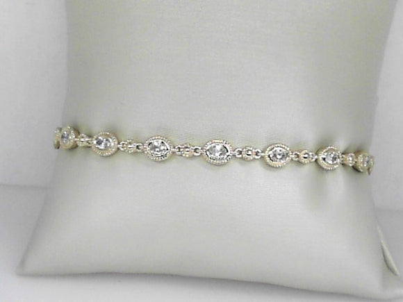 Yellow Gold Bezel Set Oval Diamond Tennis Bracelet