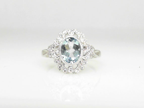 White Gold Oval Aquamarine Ring with Milgrain and 0.16 Diamond Halo