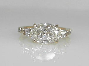Yellow Gold Lab Grown Oval Diamond Ring with Tapered Baguettes