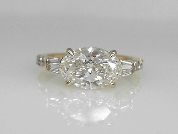 Yellow Gold Lab Grown Oval Diamond Ring with Tapered Baguettes